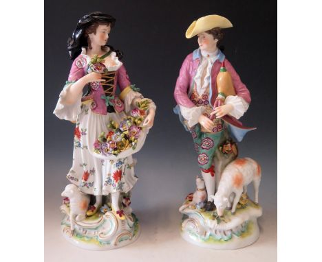 A Pair of 19th Century Volkstedt Porcelain Figurines of a Male Pipe Player and Female Flower Seller, underglaze blue crown ov