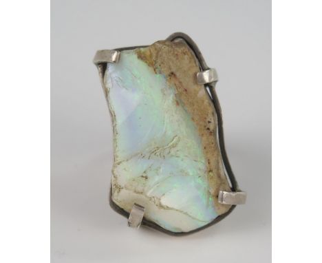 A Hallmarked Silver and Rough Opal Ring, 38 x 25mm head, size M.5, 25.4g 