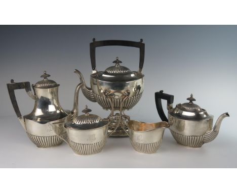 An American Sterling Silver Five part Tea Set with gadrooned decoration, 2659g