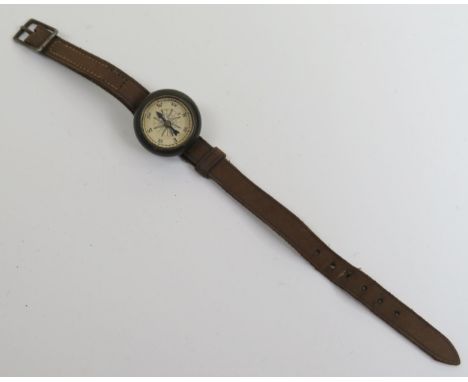 An R.A.F. Miniature Wrsit Compass, c. 2.5cm diam 