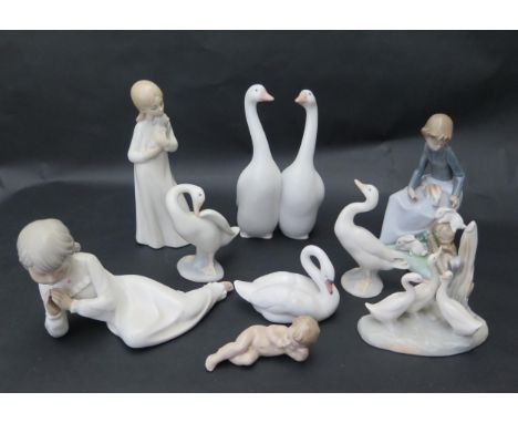 Four Lladro and Four Nao Ornaments 