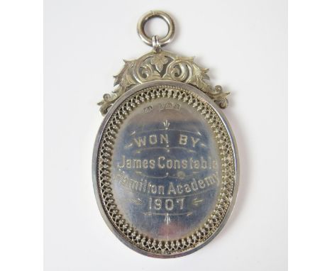 A Cased Edwardian Silver Medallion awarded to James Constable Hamilton Academy 1907 