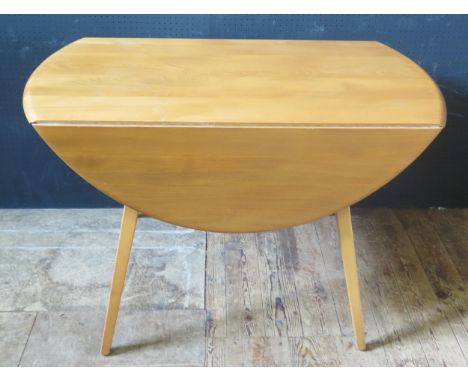 An Ercol Light Elm Drop Leaf Table 