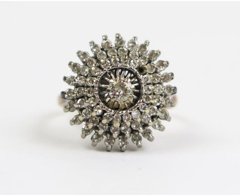 An 18ct Gold and Diamond Cluster Ring, 17.5mm head, size N.5, 6.4g 