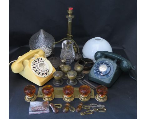 Two Old Telephones, amber glass and brass door knobs, lamp shades, chandelier, etc.