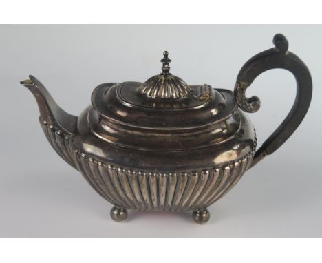 An Edward VII Silver Bachelor's Teapot, Sheffield 1814, James Dixon &amp; Sons Ltd. 20cm long, 290g 