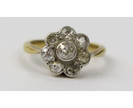 An 18ct Gold and Old Cut Diamond Eight Stone Ring, principal stone c. 3.9mm, 11mm head, size I, 3.6g 