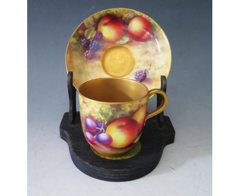 A Royal Worcester Fruit Decorated Cabinet Cup and Saucer, signed E. Townsend, 1930 (handle glued)