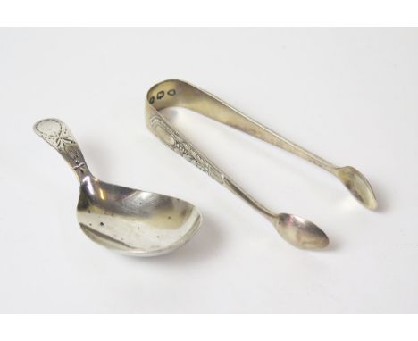 A George III Bright Cut Silver Tea Caddy Spoon (London 1796, no maker mark) and silver sugar tongs, 23.5g 