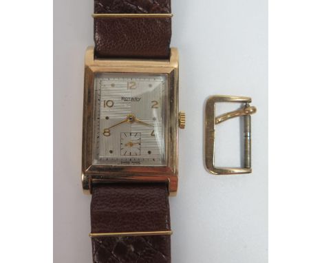 A Gent's ROTARY 9ct Gold Dress Watch, 15 jewel mechanical movement, Birmingham 1952, back and spare clasp 6.1g nett. Running 