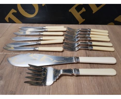 A SET OF STAINLESS STEEL AND IVOREX FISH KNIVES FORK AND SERVERS BY WALKER AND HALL