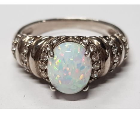 SILVER AND CZ RING WITH HUGE CREATED OPAL CENTRE STONE, 5G SIZE T