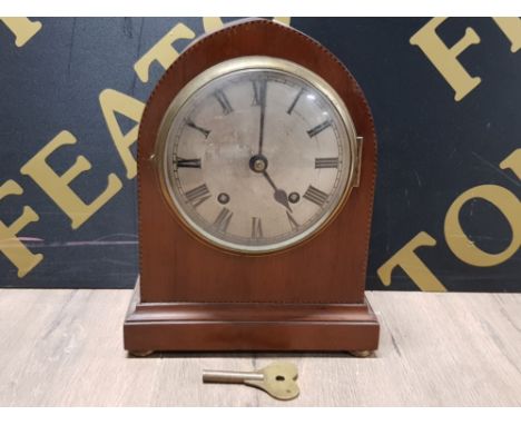 ANTIQUE MAHOGANY MANTLE CLOCK WITH SLIM INLAY AND BRASS DIAL ALSO FITTED WITH EMPIRE MECHANICS PLUS PENDULUM AND KEY