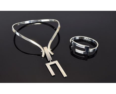 A Vintage Mexican Silver Statement Torque Necklace And Matching Bracelet Stylish modernist torque necklace in silver with chu