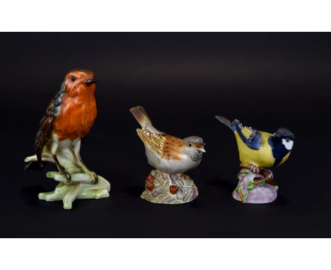 Three Pottery Bird Figures Comprising Royal Worcester Sparrow & Great Tit And A Goebel Robin Figurine 