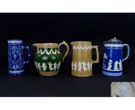 Four Various English Late 19thC Jugs comprising a Copeland late Spode wide bodied, dark green jug with applied white pate, Cl