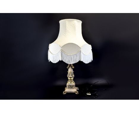 Standard Lamp On neoclassical gold tone column base with acanthus leaf trim and large cream shade. Height approx 35 inches.