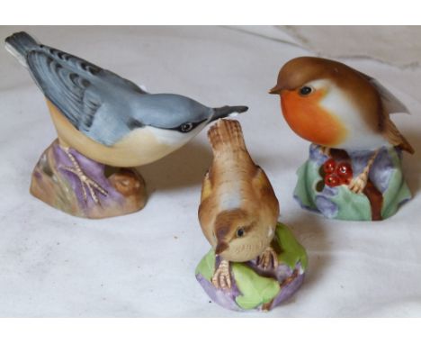 THREE WORCESTER BIRDS. Three Royal Worcester birds, wren, nuthatch and robin