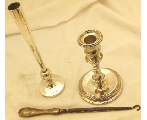 SILVER ITEMS. Hallmarked silver bud vase, candle stick and button hook