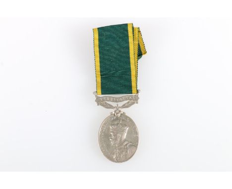 Medal of 3764150 Private G L Metcalf of the 10th Battalion The King's Regiment comprising George V Efficiency medal with TERR