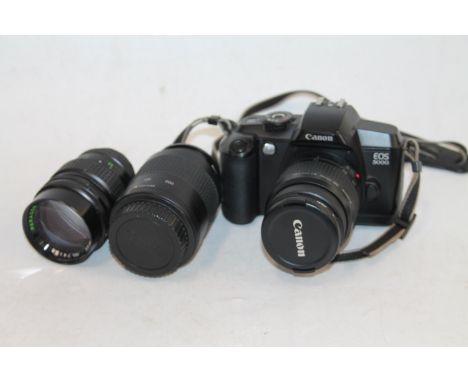 Canon E05 5000 SLR camera with Canon Zoom Lens EF 38-76mm 1:4.5-5.6, additional Paragon 1:2.8 f=135mm lens, and Canon Zoom le