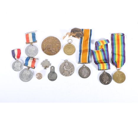 Family medal grouping to include the medals of 3580 Private T McLaughlin of the Argyll and Sutherland Highlanders comprising 