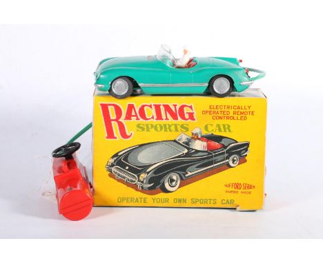 Clifford Series Racing Sports Car, electrically operated remote controlled green sports car, boxed.&nbsp; 