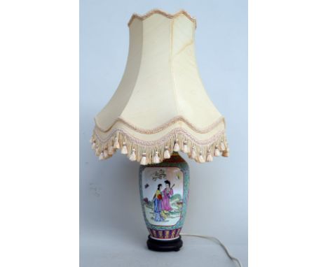 A table lamp, the base in the form of a Chinese vase with turquoise and flower reverse with figural panels of courtly ladies,