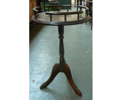 A side table with galleried circular top on tripod legs, 43cmD and 65cmH