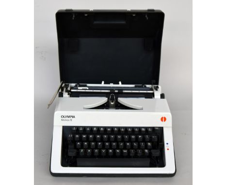 A vintage Olympia Monica-S typewriter in hard case