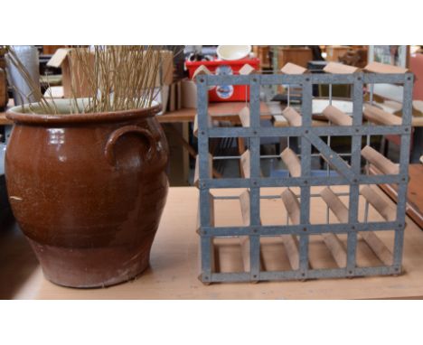 A modern wine rack for sixteen bottles, together with a stoneware glazed planter, 36cmH