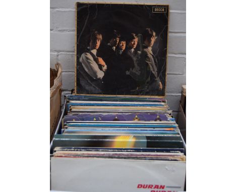 A mixed lot of vinyl LPs including Yes, The Rolling Stones, Duran Duran and Fleetwood Mac