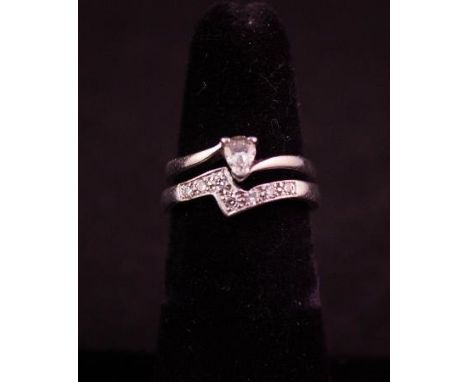 PLATINUM PEAR TWIST .25CT DIAMOND RING W/ MATCHING PLATINUM WEDDING BAND WITH DIAMOND INSET