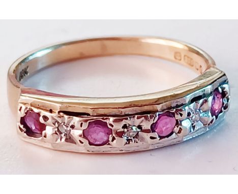 9CT GOLD 7 STONE RUBIES AND DIAMONDS RING SIZE M 2.3g

NO. 35