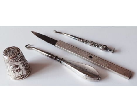 SILVER NAIL FILE, 2 MINIATURE BUTTON HOOKS AND WHITE METAL OWL THIMBLE

NO. 12