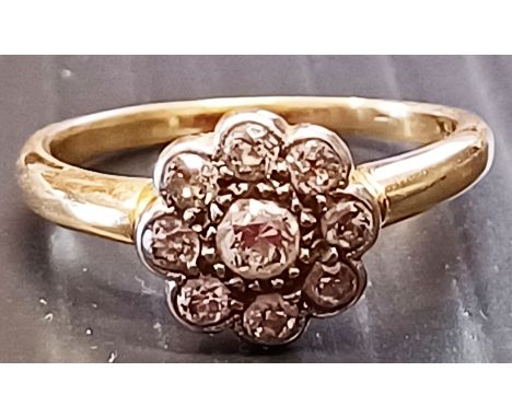 DIAMOND FLOWER RING 3.1g - UNMARKED GOLD AND APPROX 0.5CT OF DIAMONDS IN TOTAL