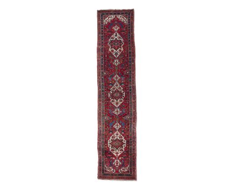 AN ANTIQUE ARMENIBAFF RUNNER,hand knotted by Armenian weavers, border area of N.W. Persian Azerbaijan and Armenia (Caucasus),