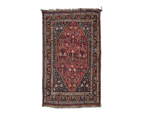 AN ANTIQUE QUASHQ'AI RUG,hand knotted by semi-nomadic weavers of the Quashq’ai tribe, Kashkuli subtribe, Fars province, S.W. 