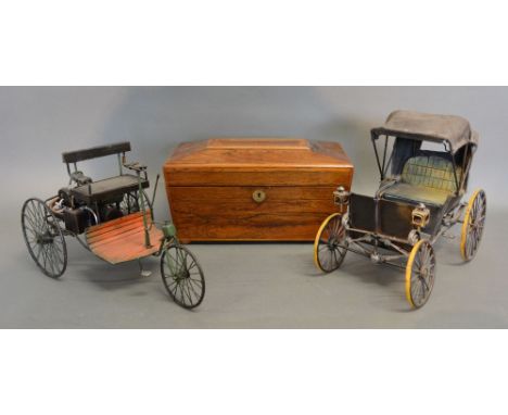 A 19th Century Rosewood Sarcophagus Tea Caddy, the hinged cover enclosing a three division interior, together with two models