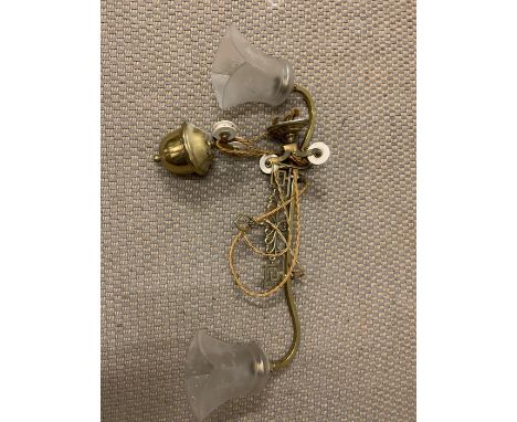 A brass hanging ceiling lamp with pully 