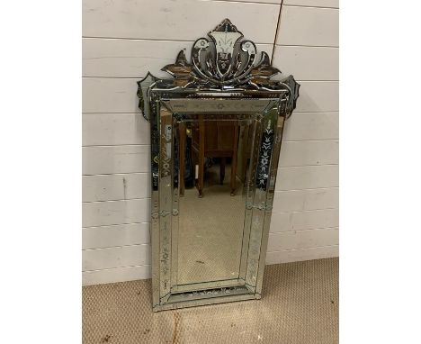 A Venetian wall hanging mirror (120cm x 58cm)