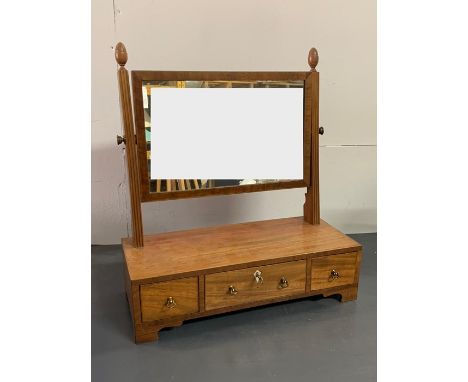 A Toilet mirror with acorn finals 