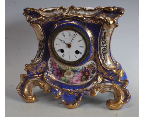 A 19th century Paris porcelain cartouche shaped mantel clock, white enamel dial inscribed J. Brigth &amp; Sons, Roman numeral