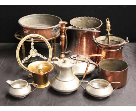 Metalware - a Middle Eastern waisted cylindrical copper pitcher; a similar copper cauldron; copper pans; 19th century brass p