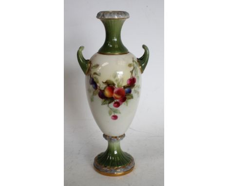 A Royal Worcester slender ovoid two handled vase, painted with fruiting branches, the fluted neck and base in green, 15.5cm h