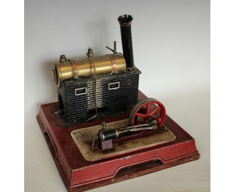 A Bing tinplate tinplate live steam model stationery engine, copper-bound brass tank, 30cm wide overall, early 20th century