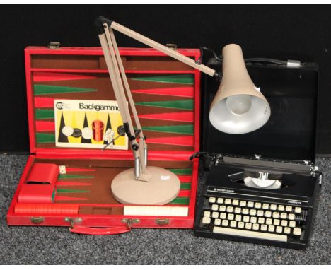 A late 20th century Anglepoise desk lamp; a Silver-Reed Silverette portable typewriter; a backgammon set (3)