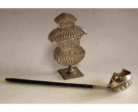 An 18th century Continental silver punch ladle, ebonised handle; a Continental white metal caddy or canister (2)