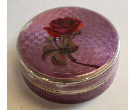 An early 20th century silver and enamel circular snuff box, c.1920
