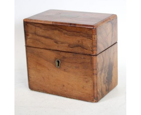 A 19th century walnut casket, enclosing a clear glass double inkwell